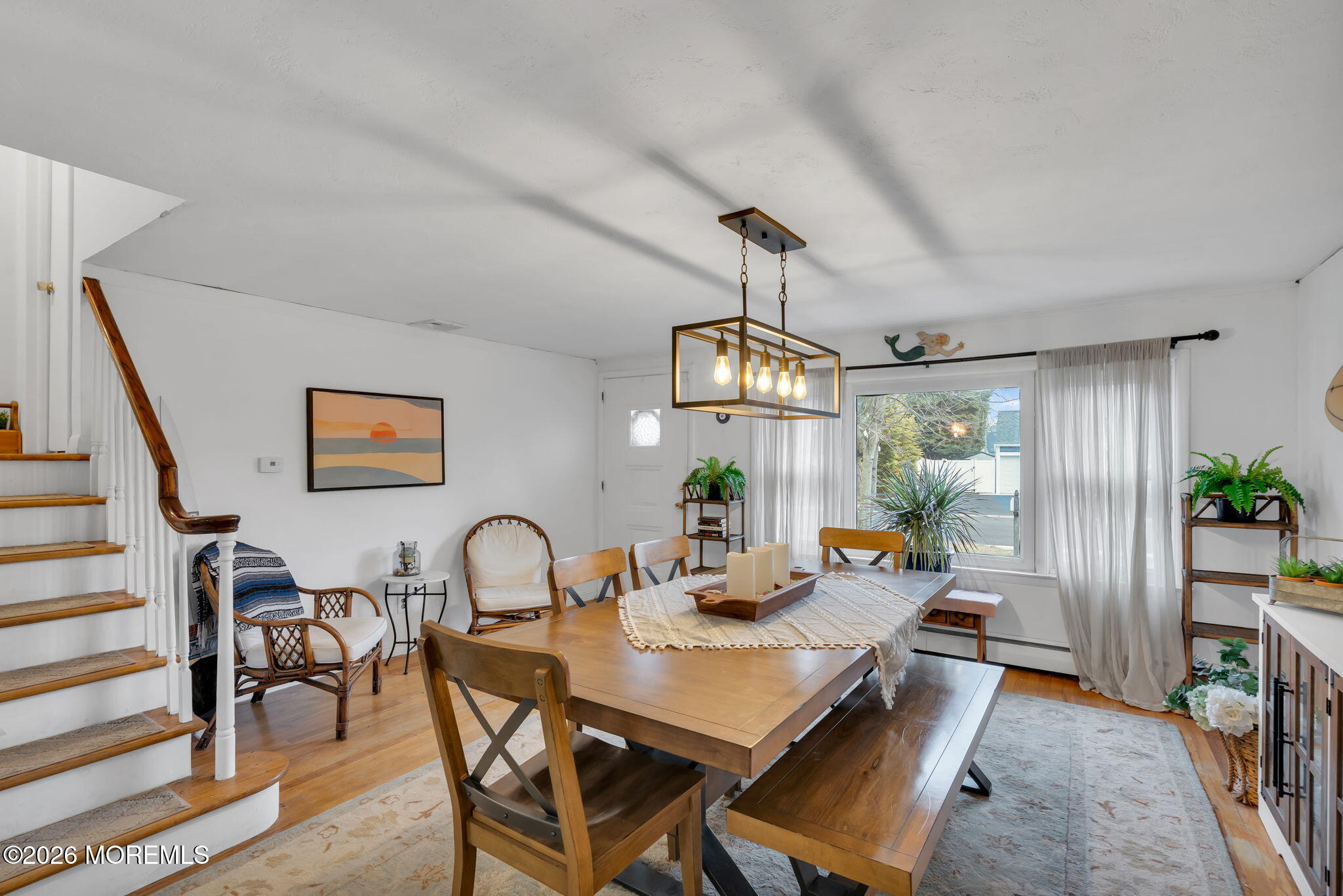 1129 Roe Avenue Point Pleasant, NJ 08742 - Photo 11 of 71 a view of a dining room with furniture window and wooden floor