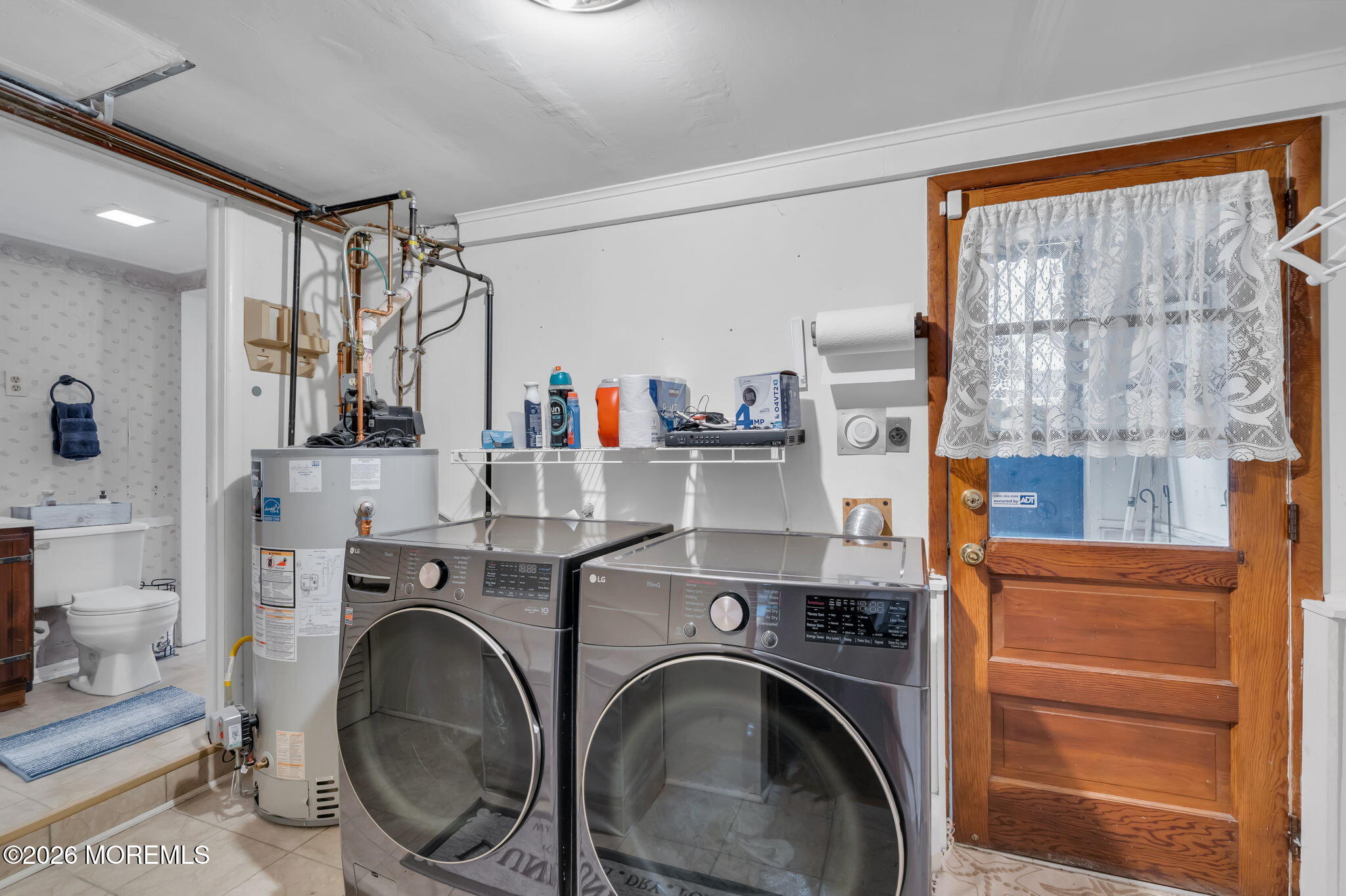 1129 Roe Avenue Point Pleasant, NJ 08742 - Photo 27 of 71 a view of livingroom with washer and dryer