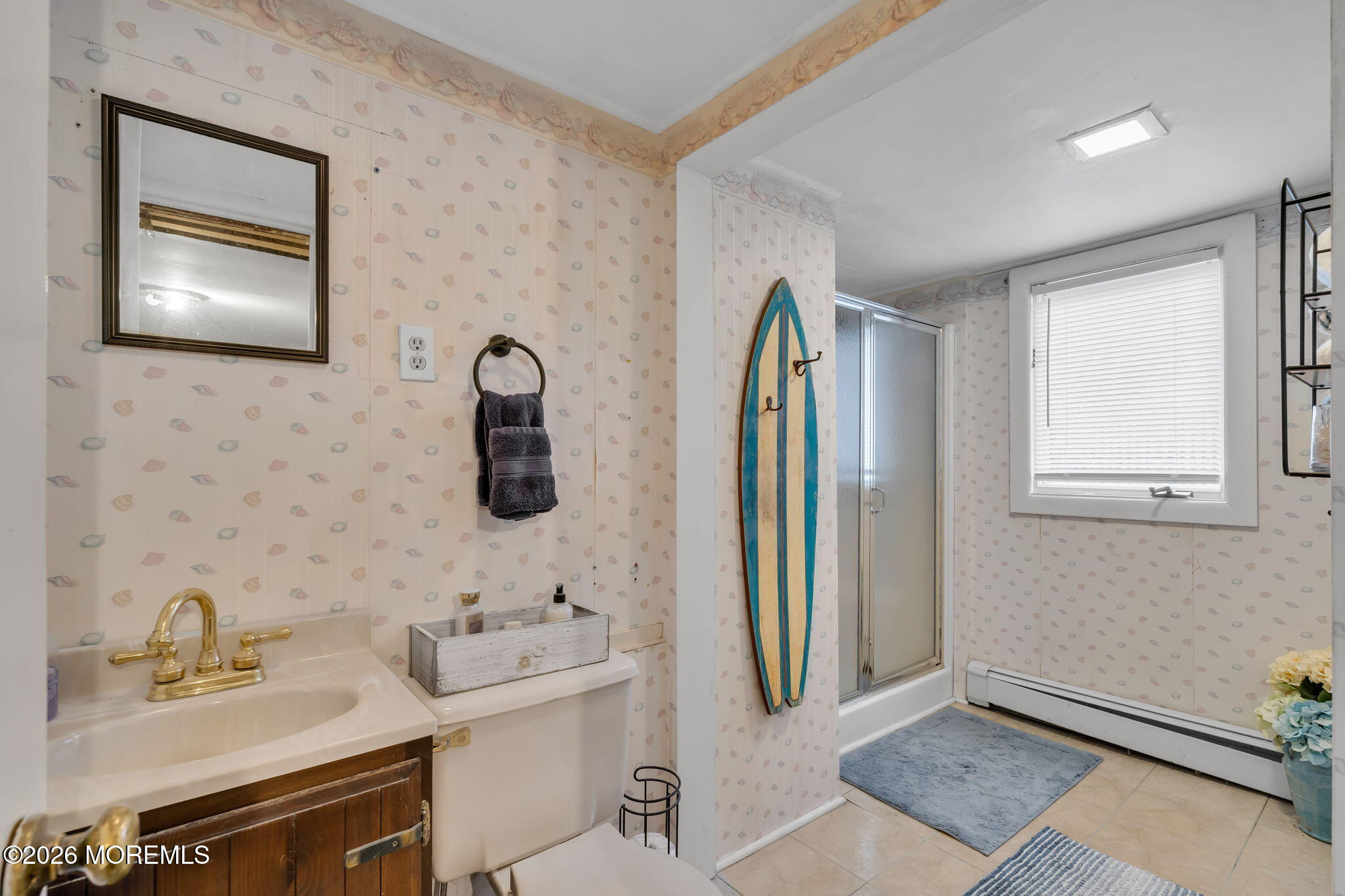 1129 Roe Avenue Point Pleasant, NJ 08742 - Photo 28 of 71 a bathroom with a sink and a mirror