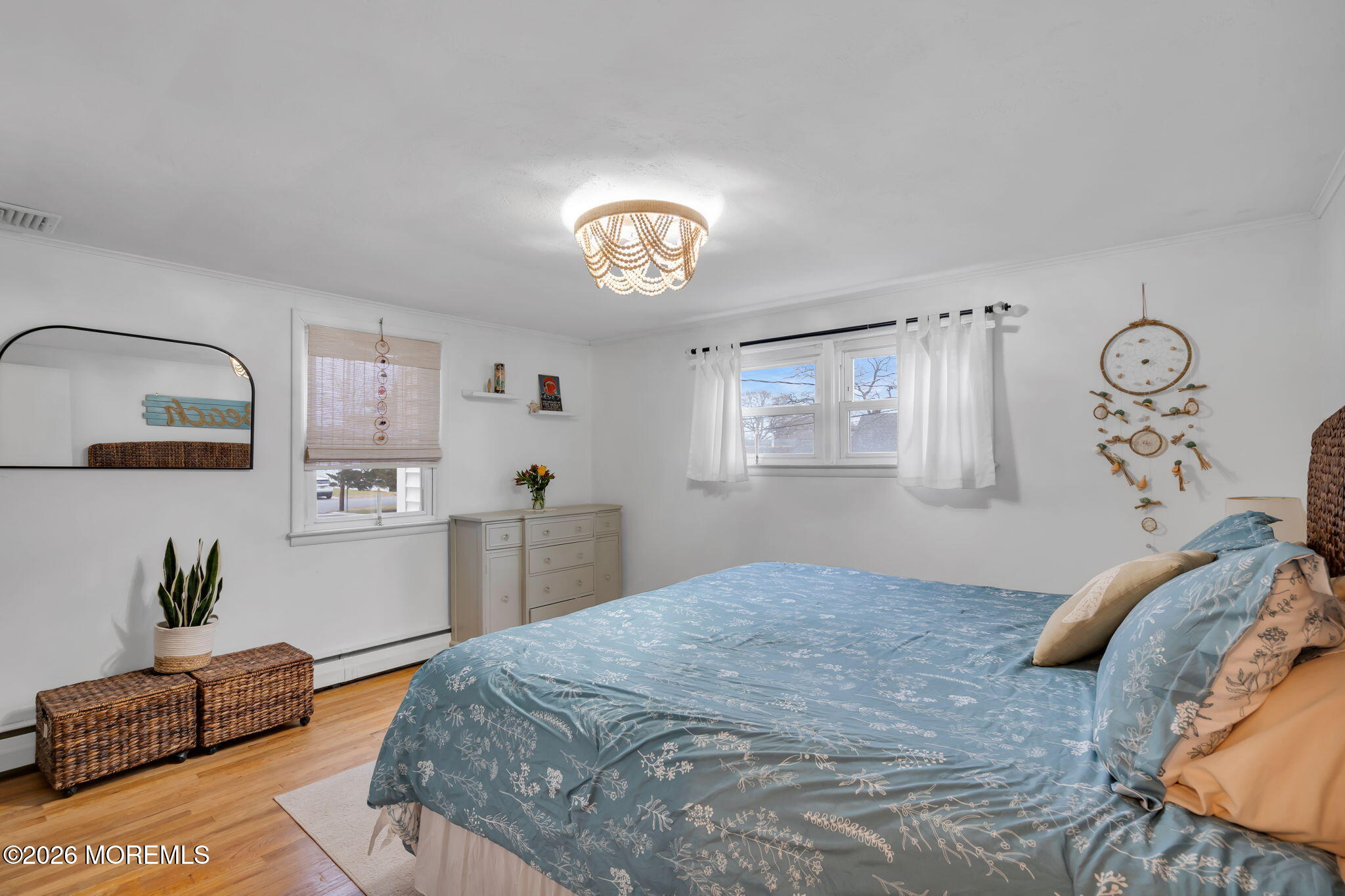 1129 Roe Avenue Point Pleasant, NJ 08742 - Photo 29 of 71 a bedroom with a large bed and a window