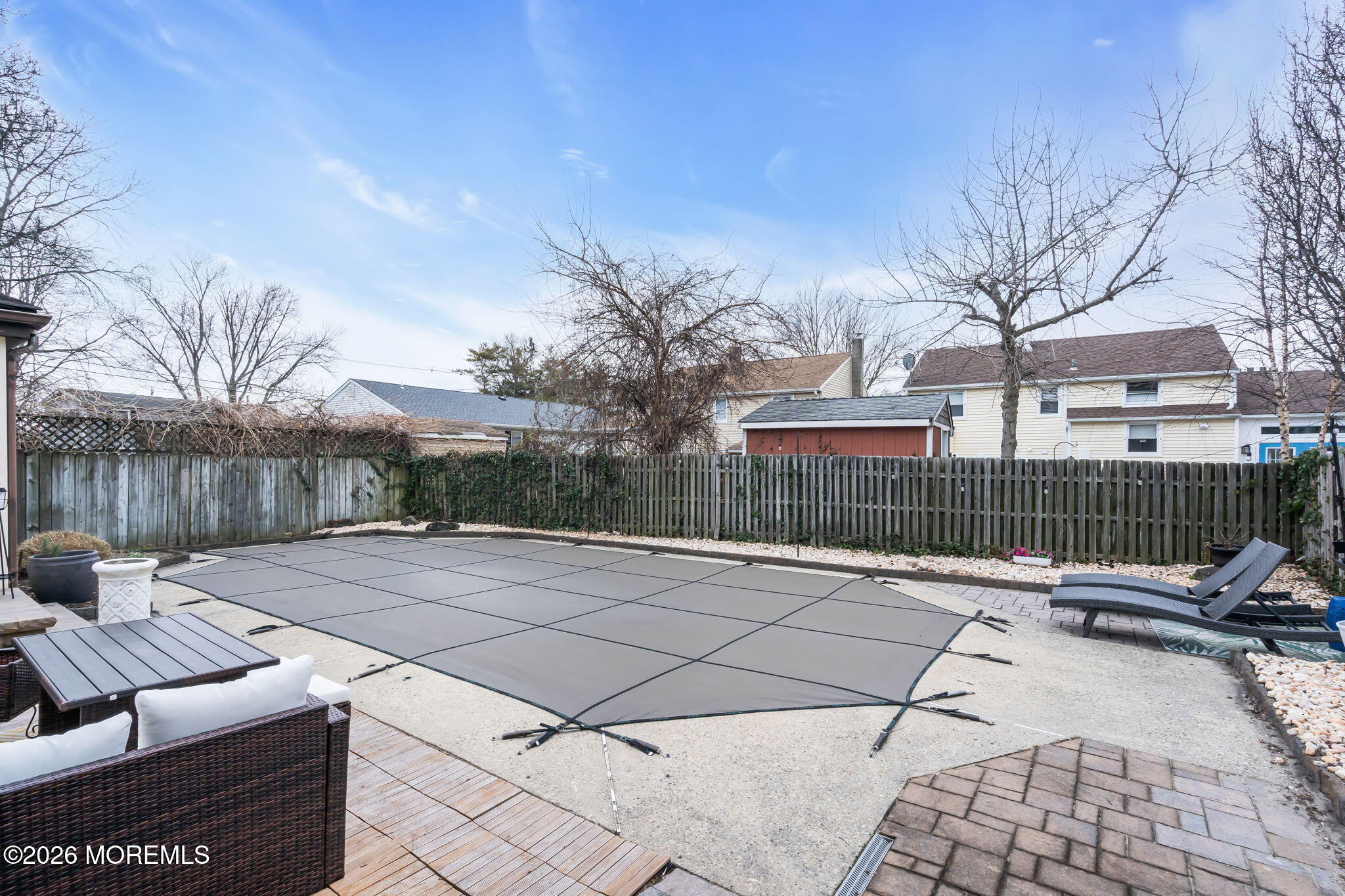 1129 Roe Avenue Point Pleasant, NJ 08742 - Photo 37 of 71 a backyard of a house with outdoor seating