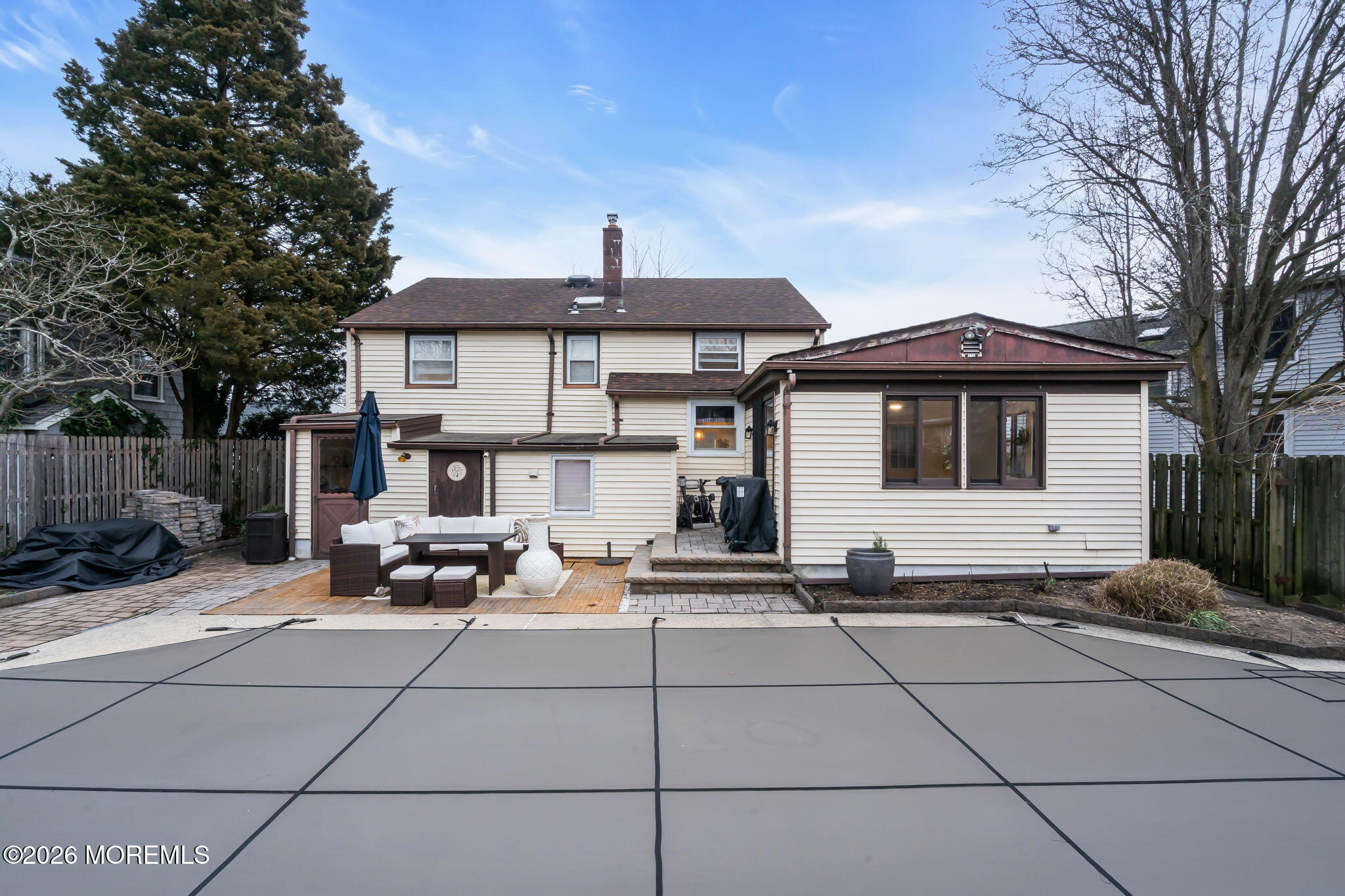 1129 Roe Avenue Point Pleasant, NJ 08742 - Photo 38 of 71 a couple of table and chairs in front of house