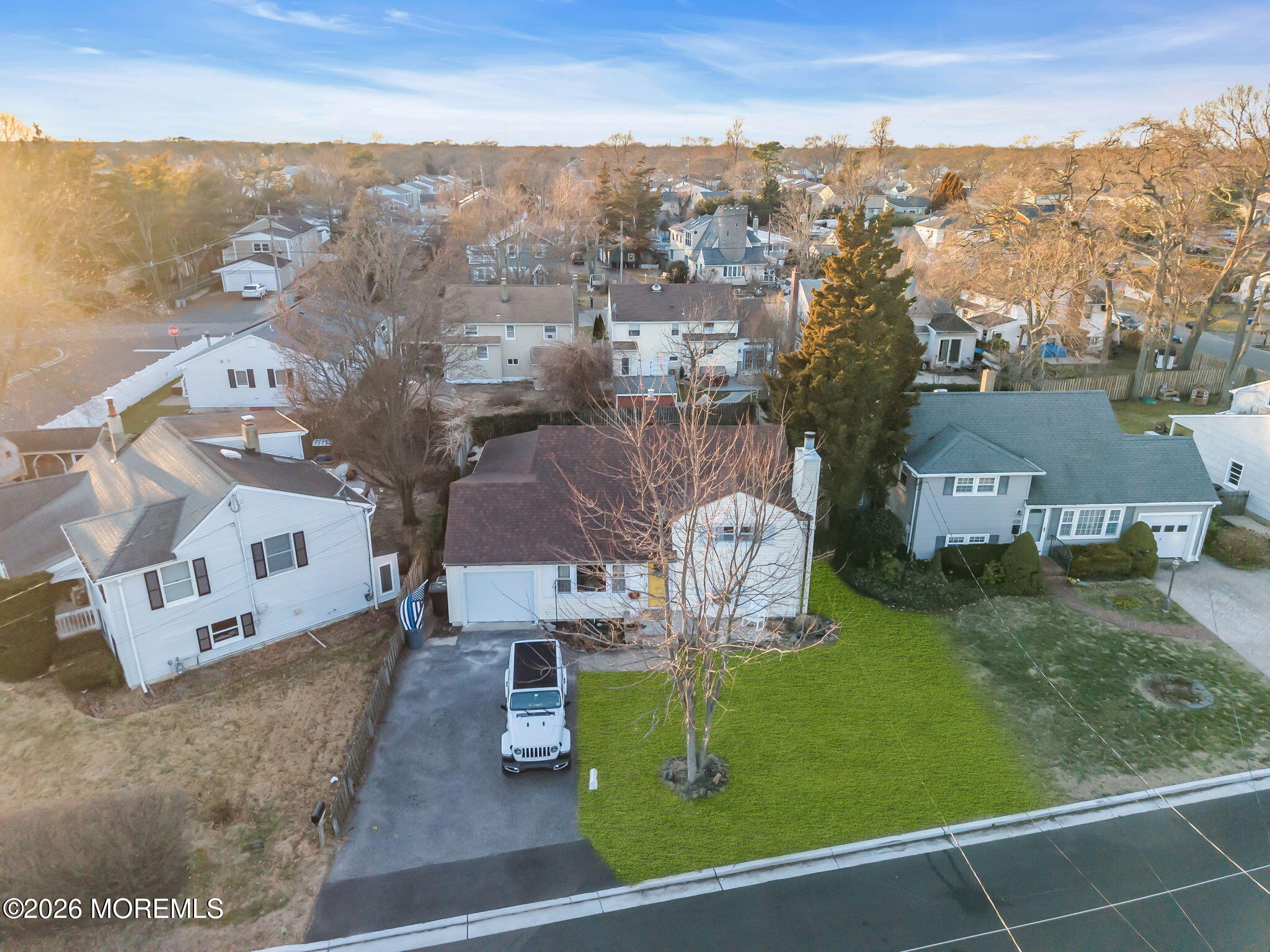 1129 Roe Avenue Point Pleasant, NJ 08742 - Photo 65 of 71 an aerial view of residential houses with outdoor space and trees