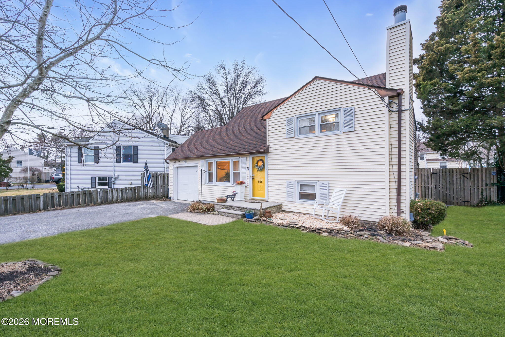 1129 Roe Avenue Point Pleasant, NJ 08742 - Photo 7 of 71 a front view of house with a garden and patio