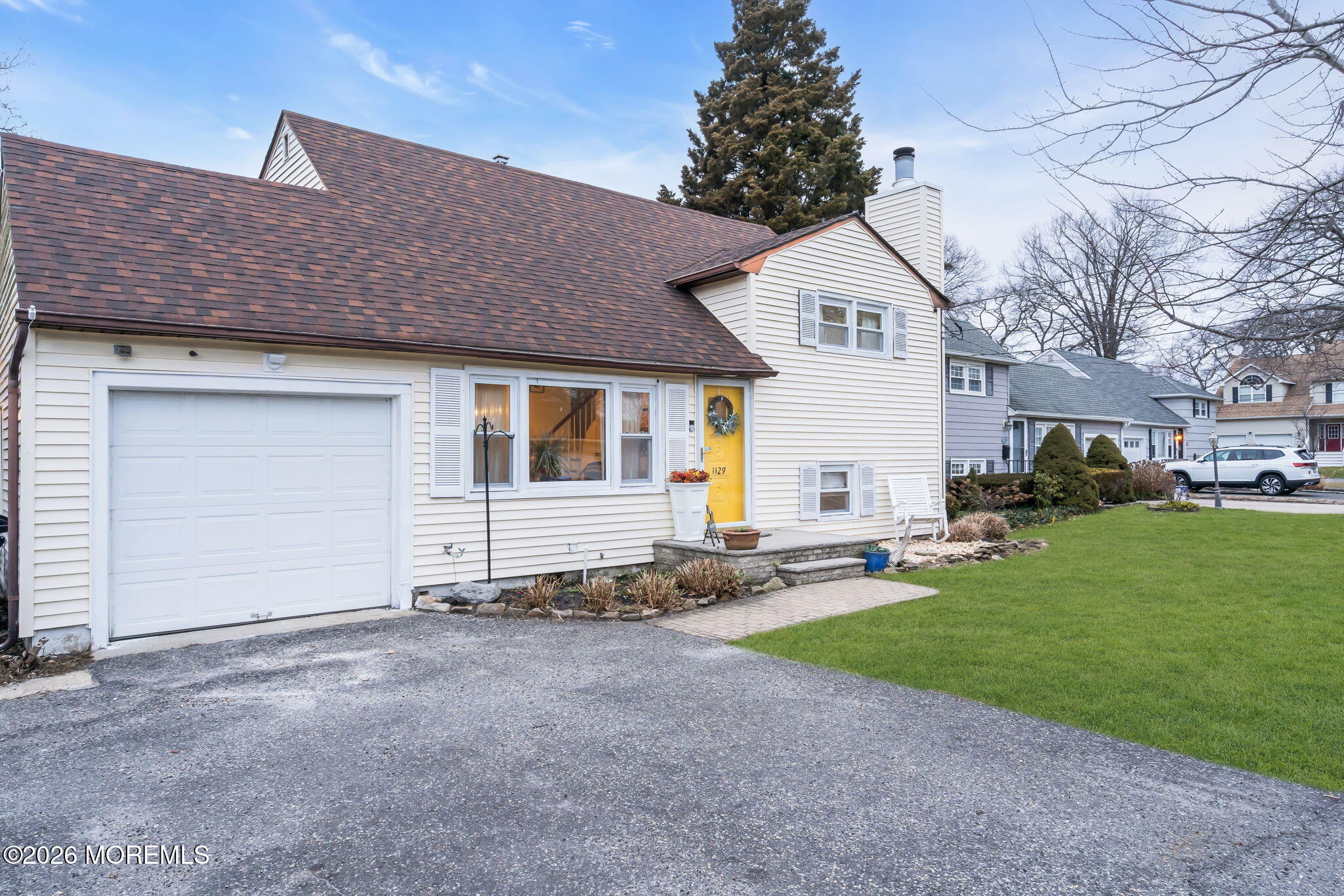 1129 Roe Avenue Point Pleasant, NJ 08742 - Photo 8 of 71 a view of a house with a yard