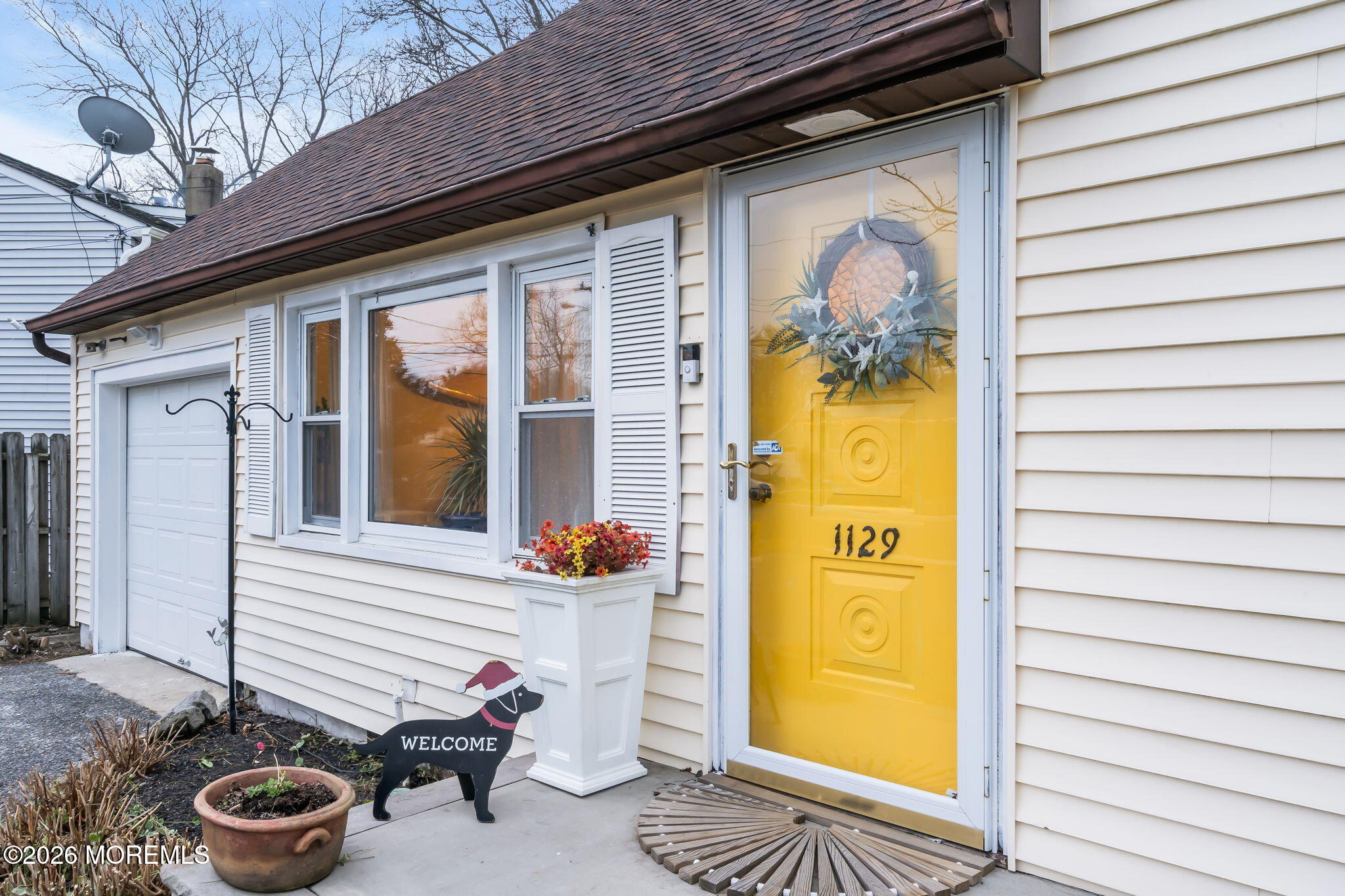 1129 Roe Avenue Point Pleasant, NJ 08742 - Photo 9 of 71 a view of a door of the house
