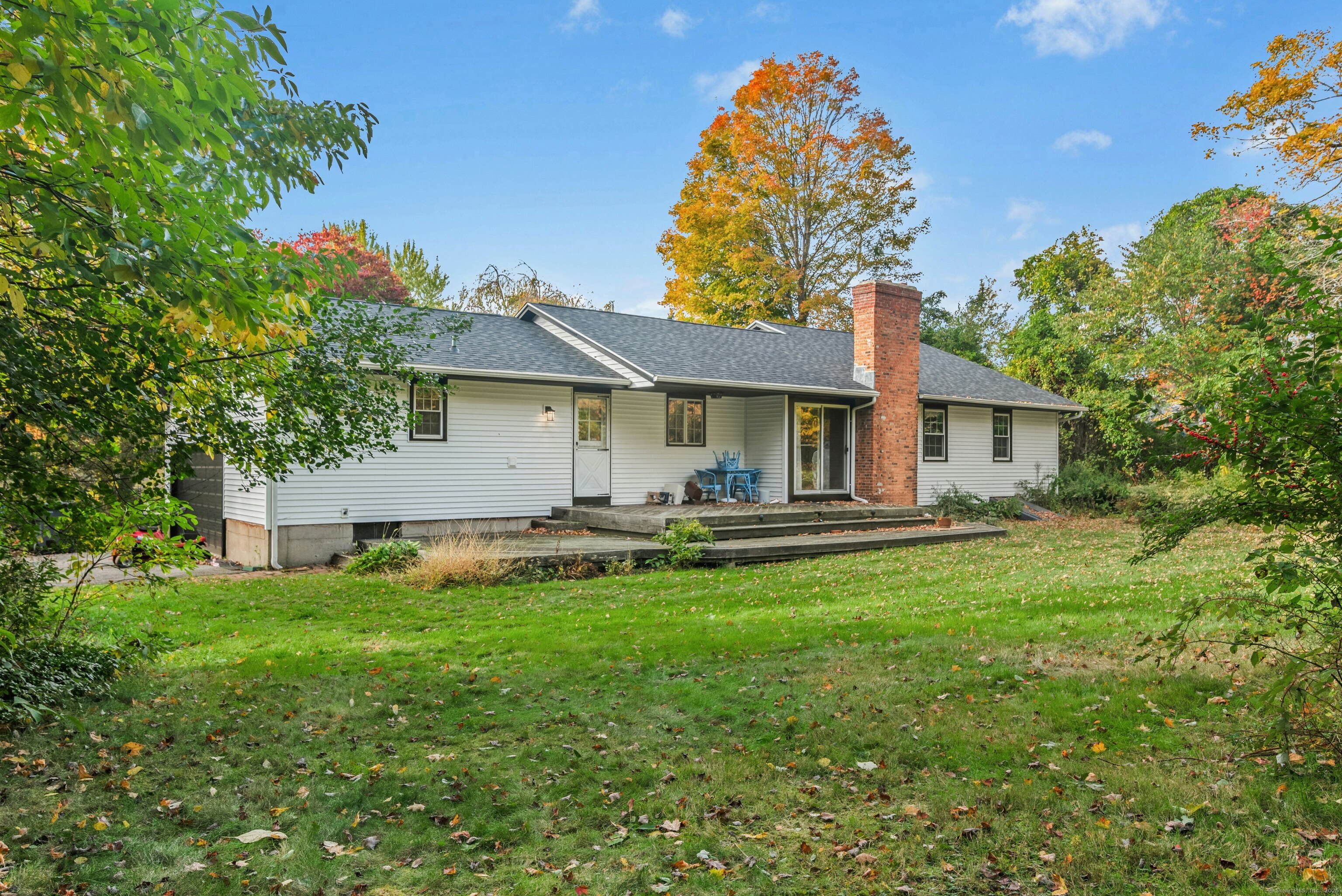 340 Moose Hill Road Monroe, CT 06468 - Photo 20 of 21 a front view of a house with patio and garden
