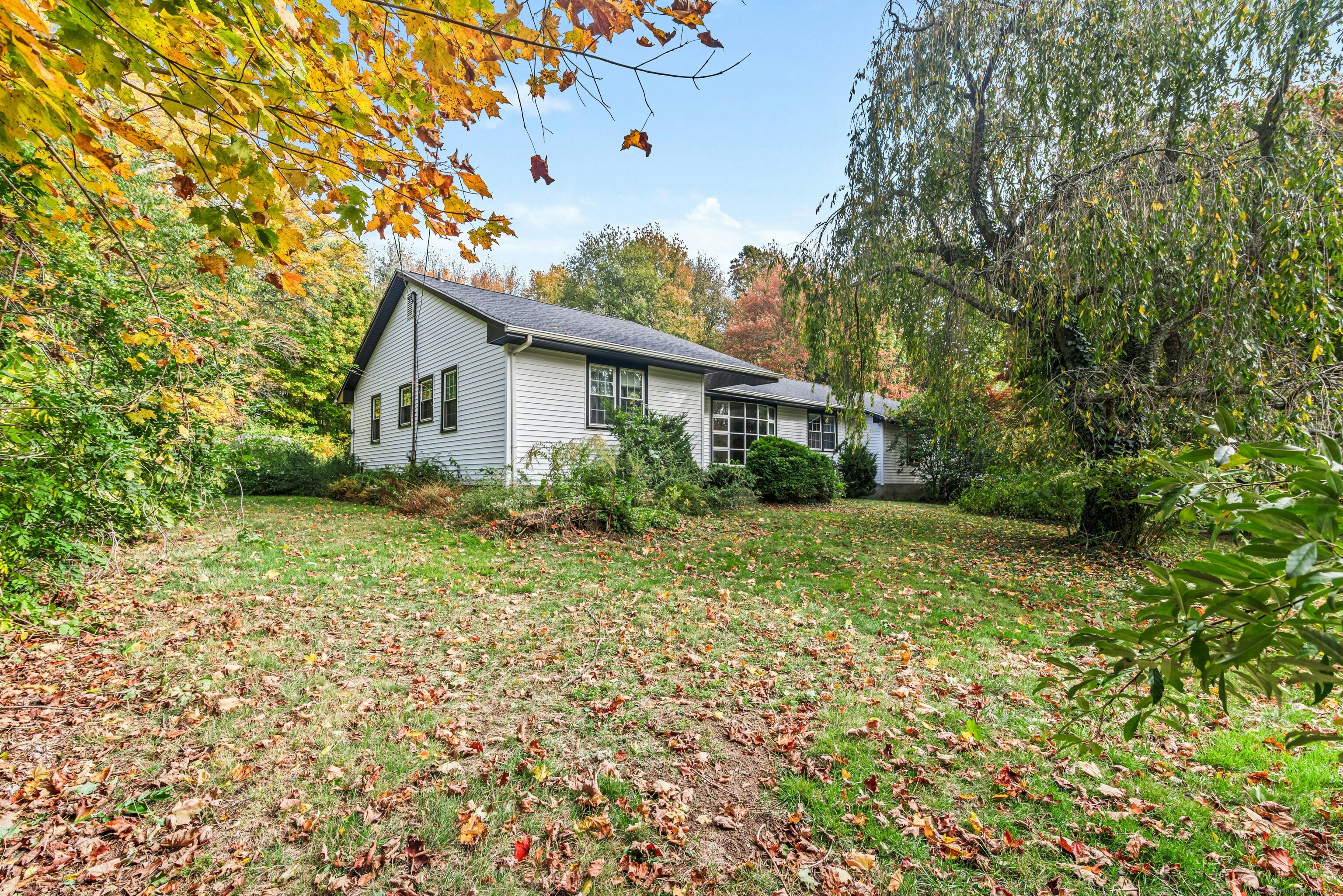 340 Moose Hill Road Monroe, CT 06468 - Photo 5 of 21 a house view with a garden space