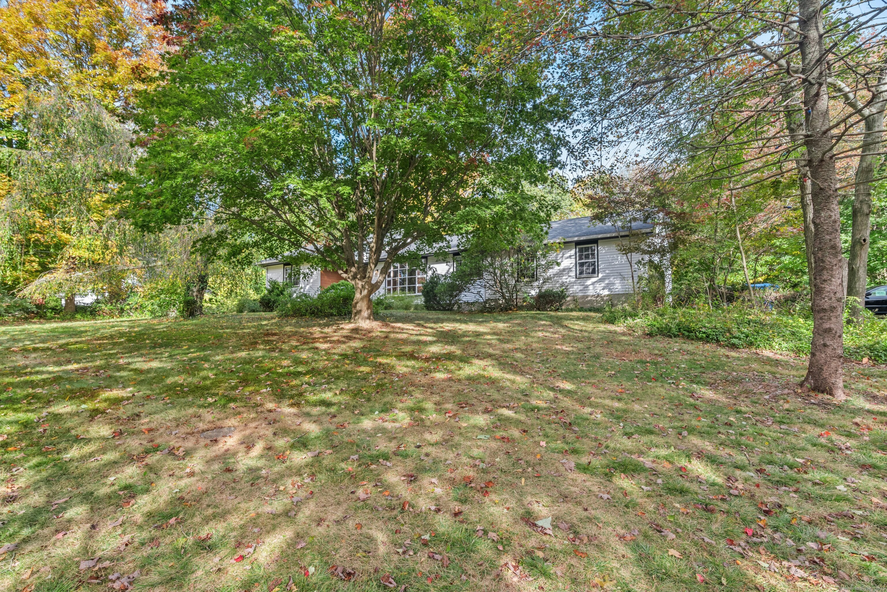 340 Moose Hill Road Monroe, CT 06468 - Photo 6 of 21 a view of a field with trees in front of it