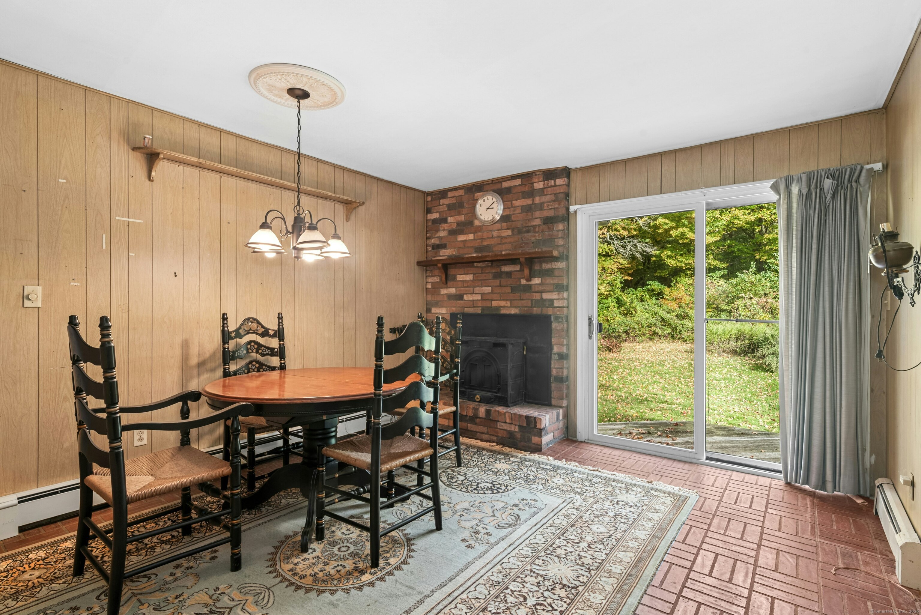 340 Moose Hill Road Monroe, CT 06468 - Photo 10 of 21 a view of a dining room with furniture window and outside view