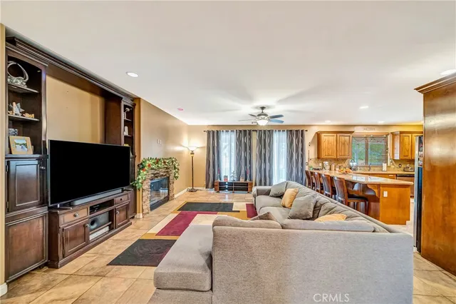 a large kitchen with a table and chairs