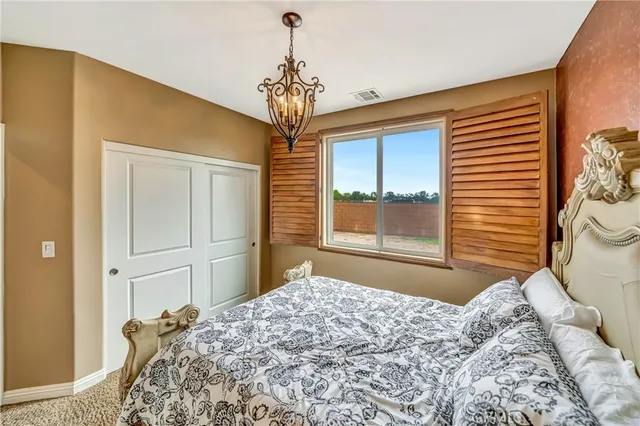 a large kitchen with stainless steel appliances granite countertop a stove and cabinets