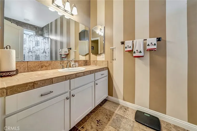 a view of a livingroom with furniture and a garage