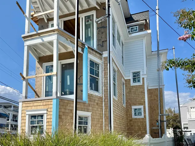 a view of a building with a street