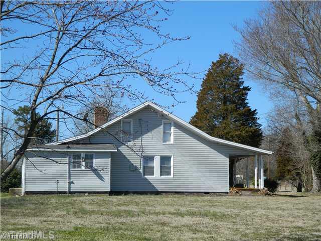 Exterior Front. Side View of Farm House