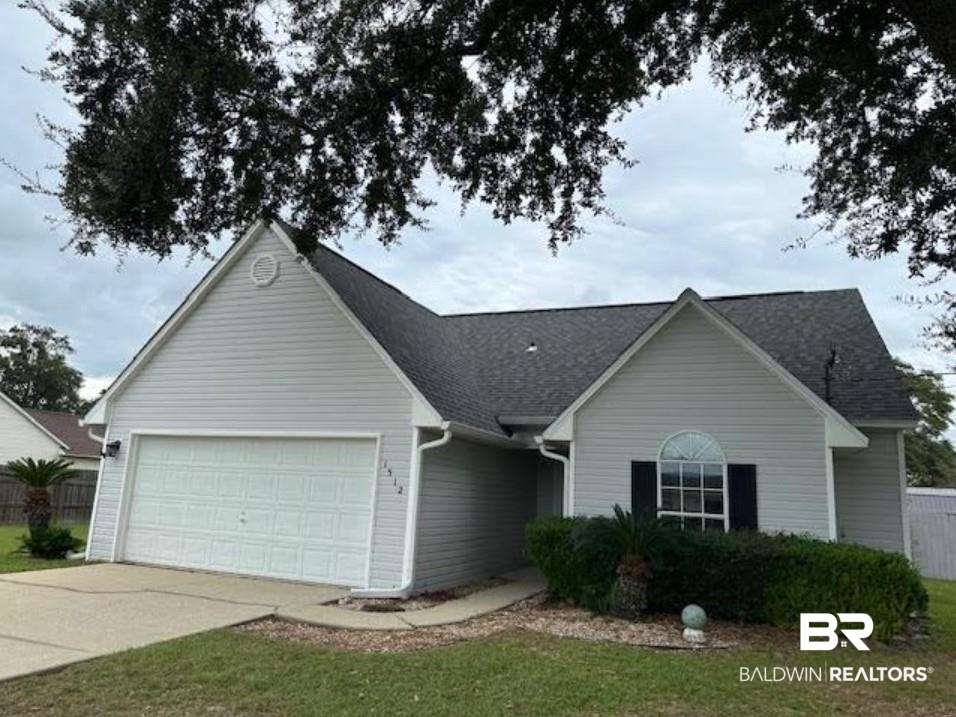 1512 North Cedar Street Foley, AL 36535 - Photo 1 of 13 Single story home with a garage