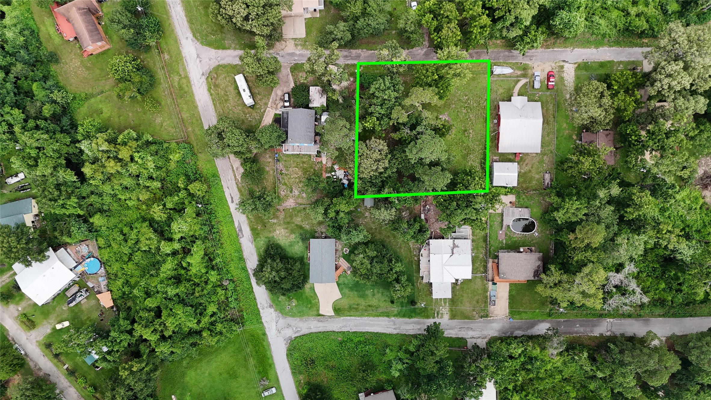 0 Walnut Lane Point Blank, TX 77364 - Photo 3 of 11 Closer aerial view of your lots and the surrounding area. Quiet neighborhood, unrestricted with easy access to lake living.