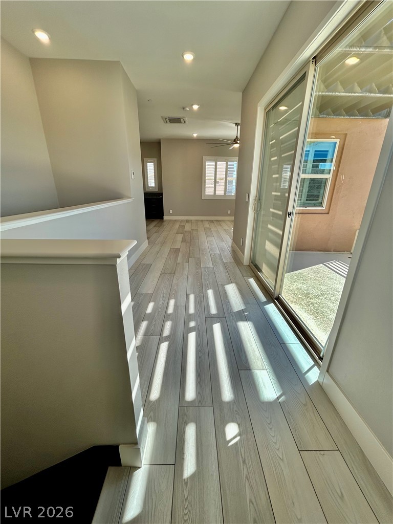 4262 Swift Street Las Vegas, NV 89135 - Photo 67 of 75 Corridor with light wood-type flooring and recessed lighting