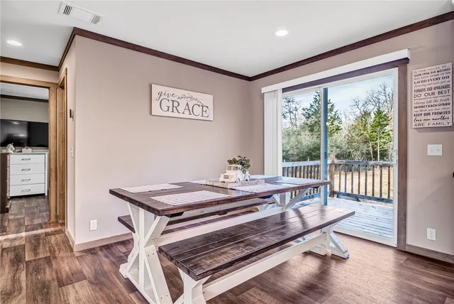a kitchen with granite countertop a sink and a stove top oven