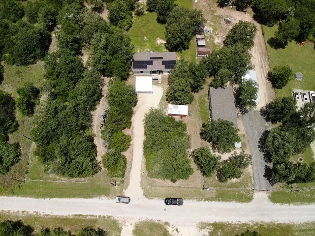 a view of a pathway with a yard