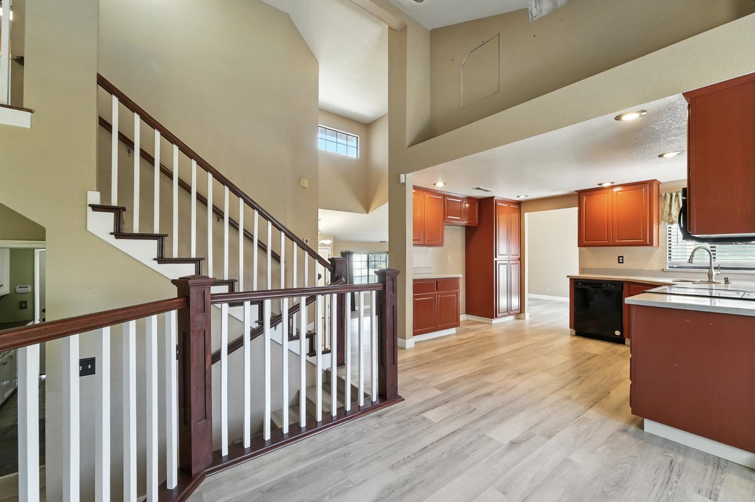 834 Cedar Ridge Drive Turlock, CA 95382 - Photo 24 of 57 a view of a kitchen with a sink and a stove top oven
