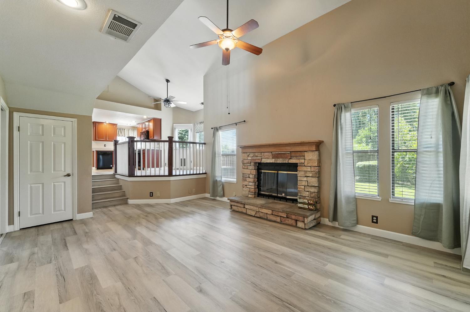 834 Cedar Ridge Drive Turlock, CA 95382 - Photo 26 of 57 a view of a livingroom with a fireplace and window