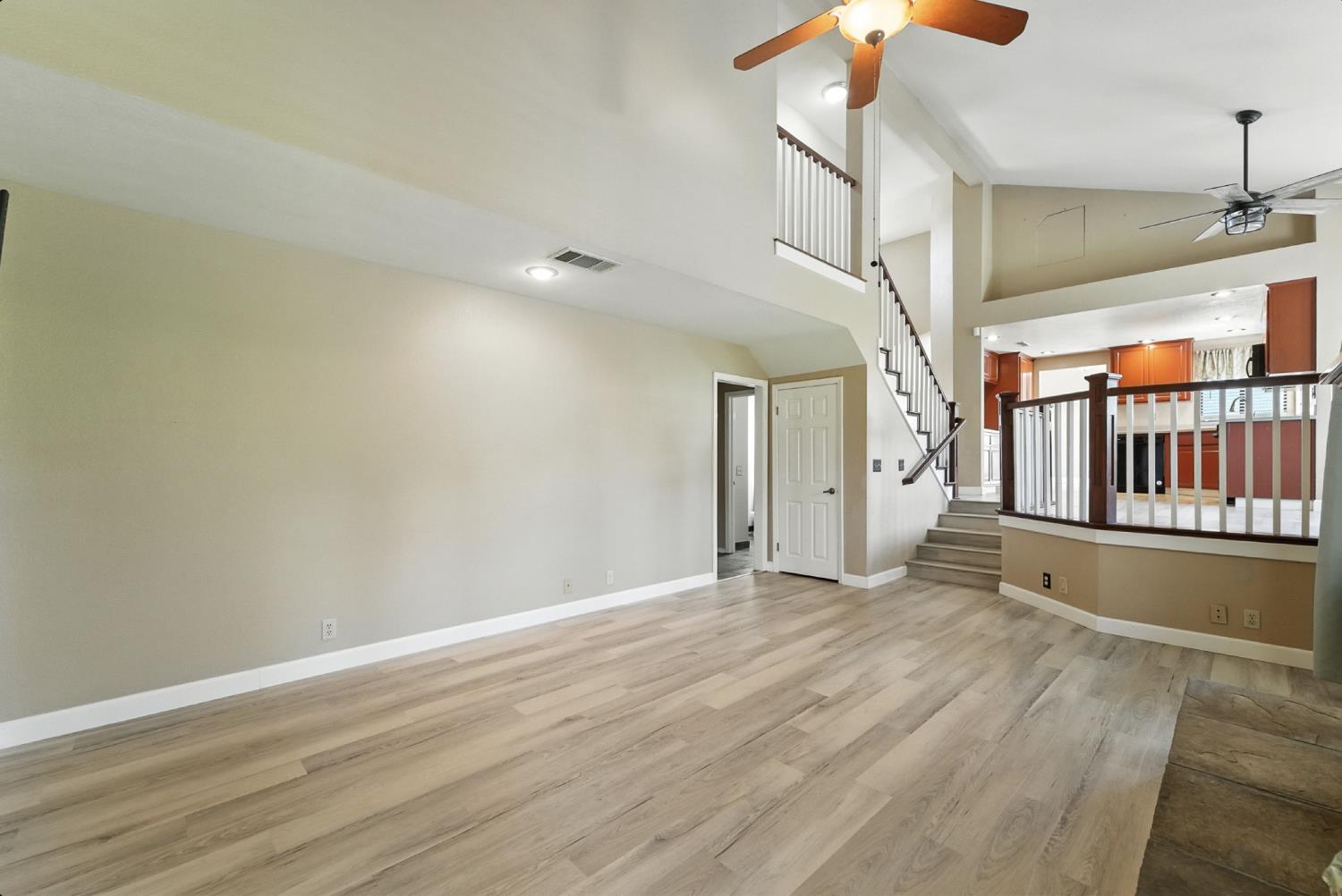 834 Cedar Ridge Drive Turlock, CA 95382 - Photo 27 of 57 a view of an empty room with stairs
