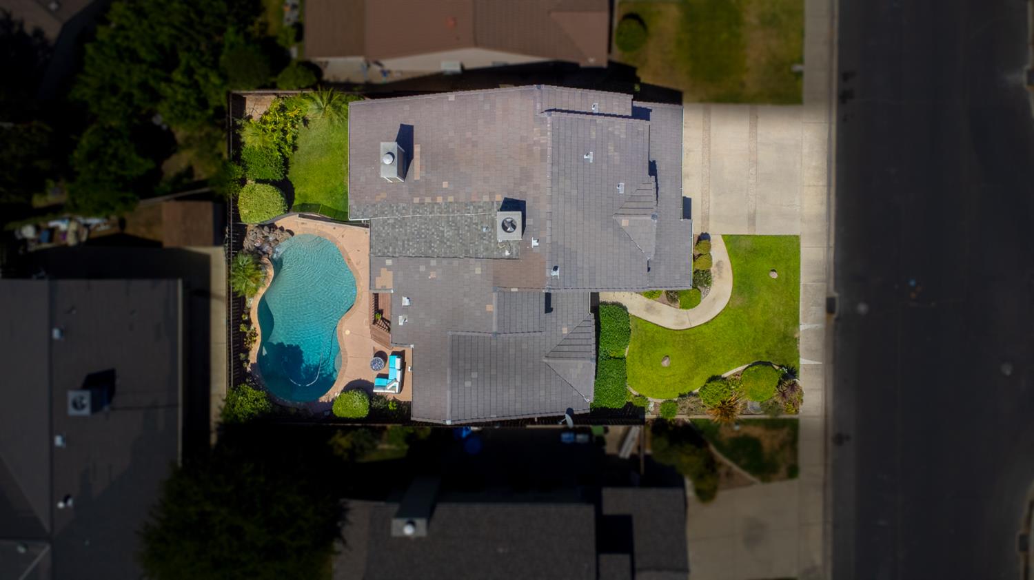 834 Cedar Ridge Drive Turlock, CA 95382 - Photo 3 of 57 an aerial view of a house with a swimming pool