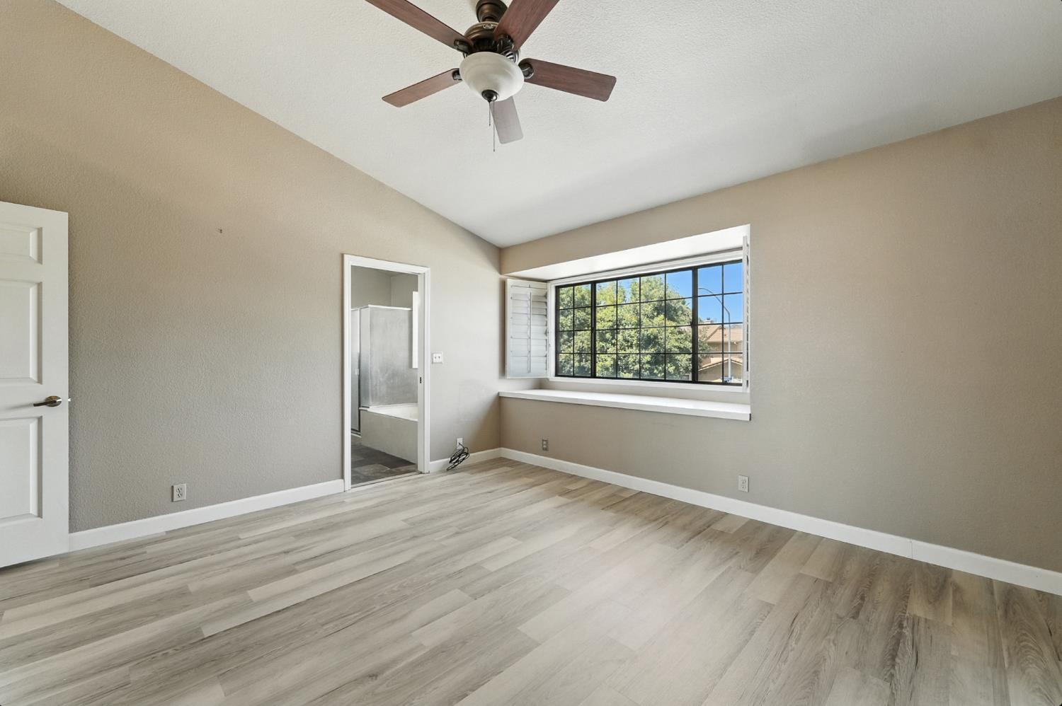 834 Cedar Ridge Drive Turlock, CA 95382 - Photo 43 of 57 a view of an empty room with a window