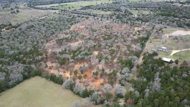 a view of a field with an outdoor space