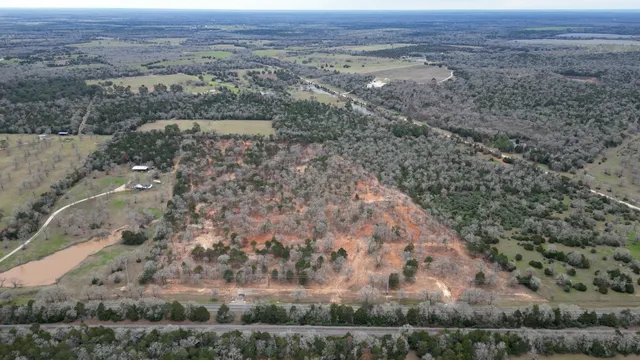 an aerial view of mountain with beach