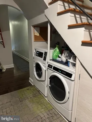 a utility room with dryer and washer