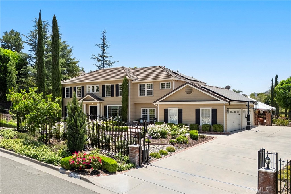 18385 Moss Road Riverside, CA 92508 - Photo 1 of 1 a front view of a house with garden