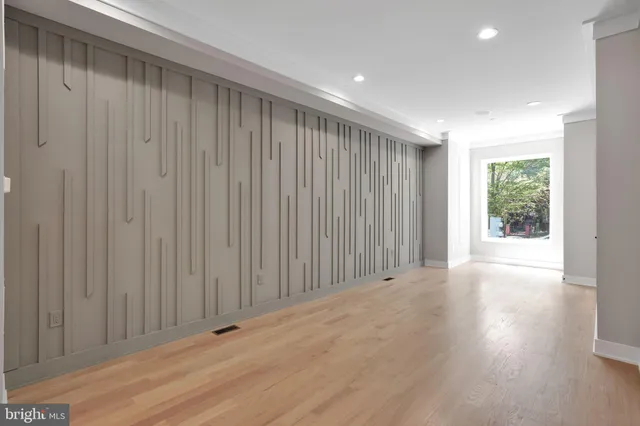 a view of a livingroom with wooden floor