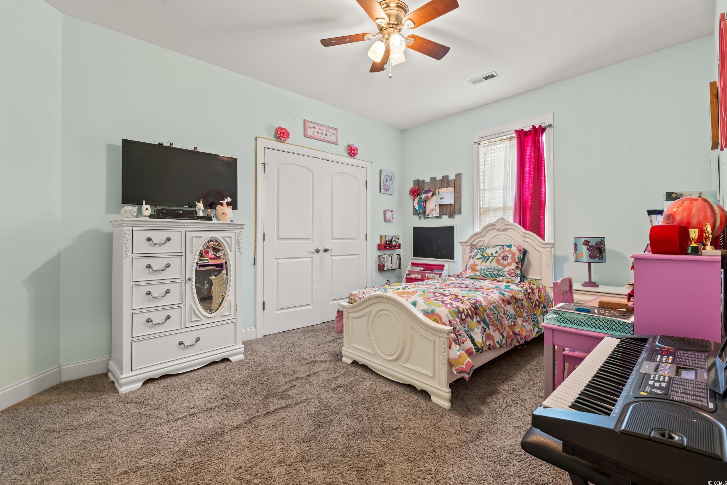 1051 Academy Drive Conway, SC 29526 - Photo 20 of 37 Carpeted bedroom featuring baseboards and a ceiling fan