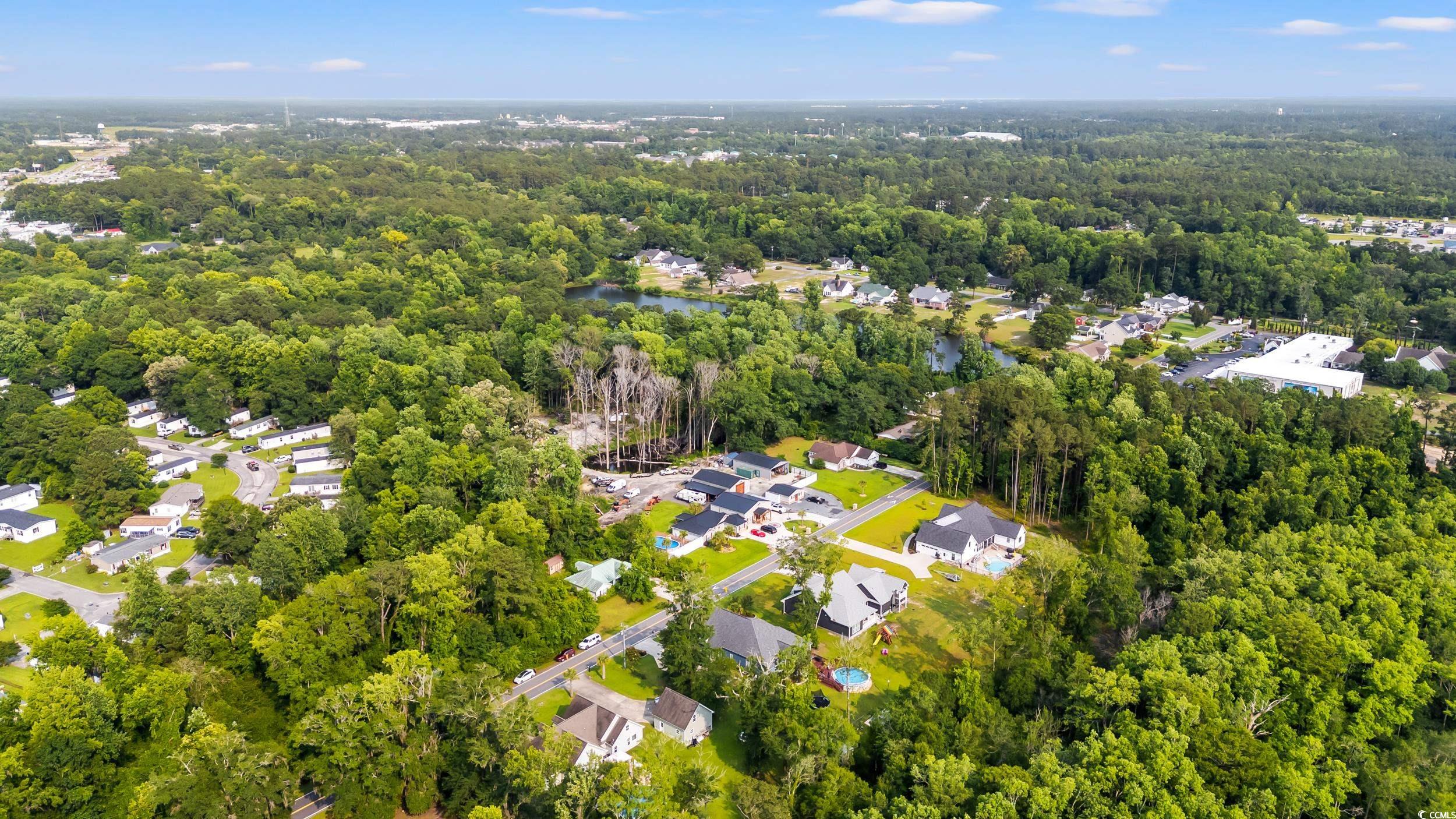 1051 Academy Drive Conway, SC 29526 - Photo 34 of 37 View of property location with a forest and nearby suburban area