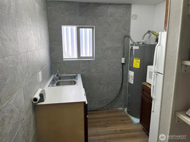 a bathroom with a sink and toilet