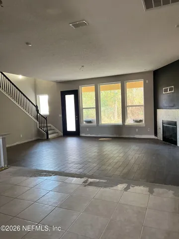 a large kitchen with stainless steel appliances kitchen island granite countertop a cabinets and a counter space