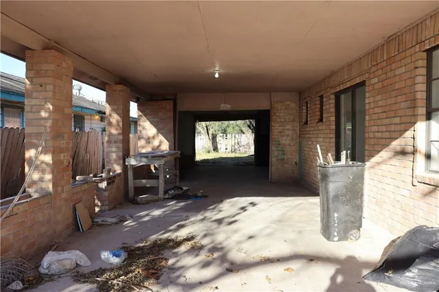 a view of a livingroom with furniture and windows