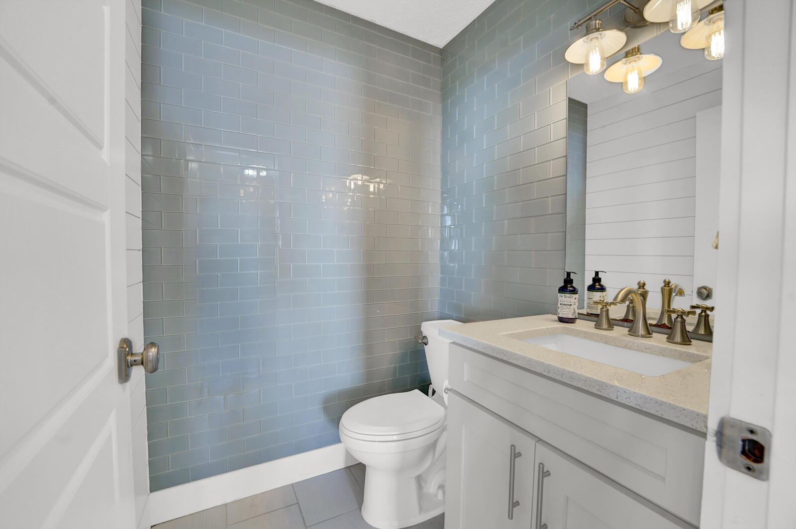 1020 Bay Grove Road Freeport, FL 32439 - Photo 18 of 71 a bathroom with a sink a toilet and shower