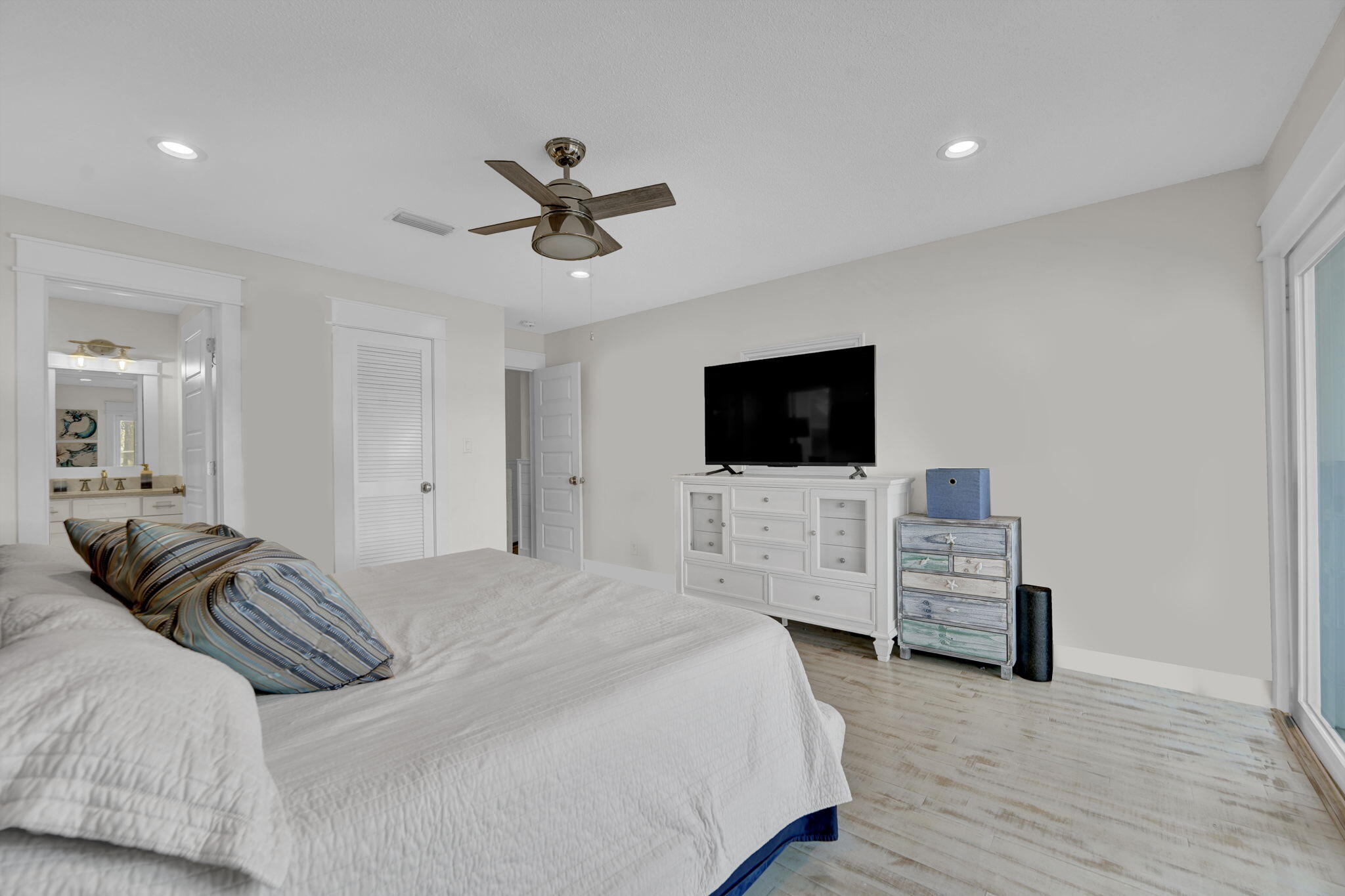1020 Bay Grove Road Freeport, FL 32439 - Photo 36 of 71 a bedroom with a bed and a flat screen tv