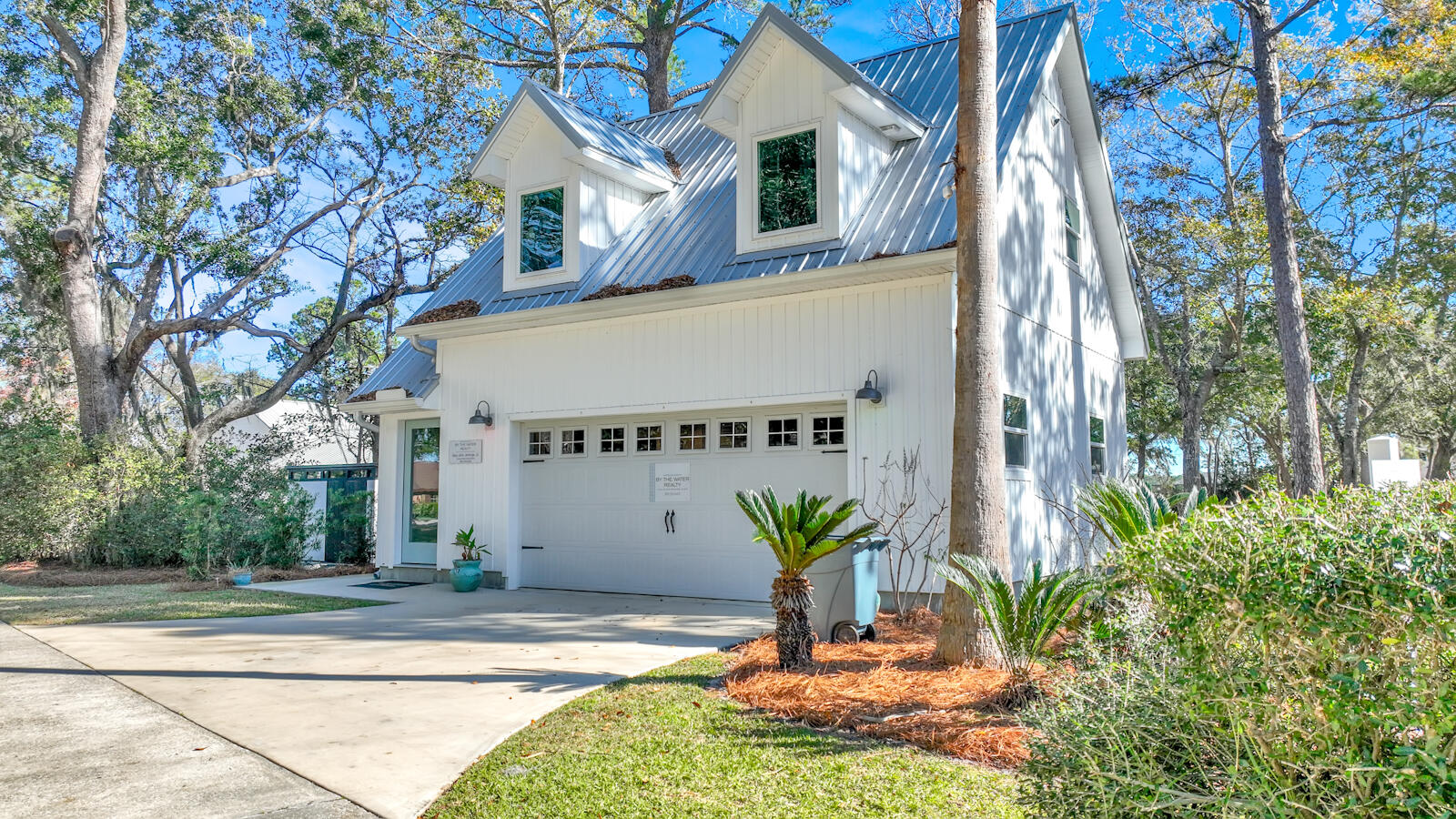 1020 Bay Grove Road Freeport, FL 32439 - Photo 41 of 71 a front view of a house with garden