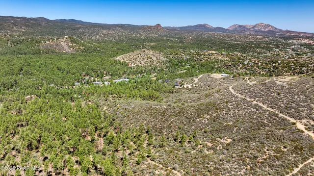 a view of mountain with lake view