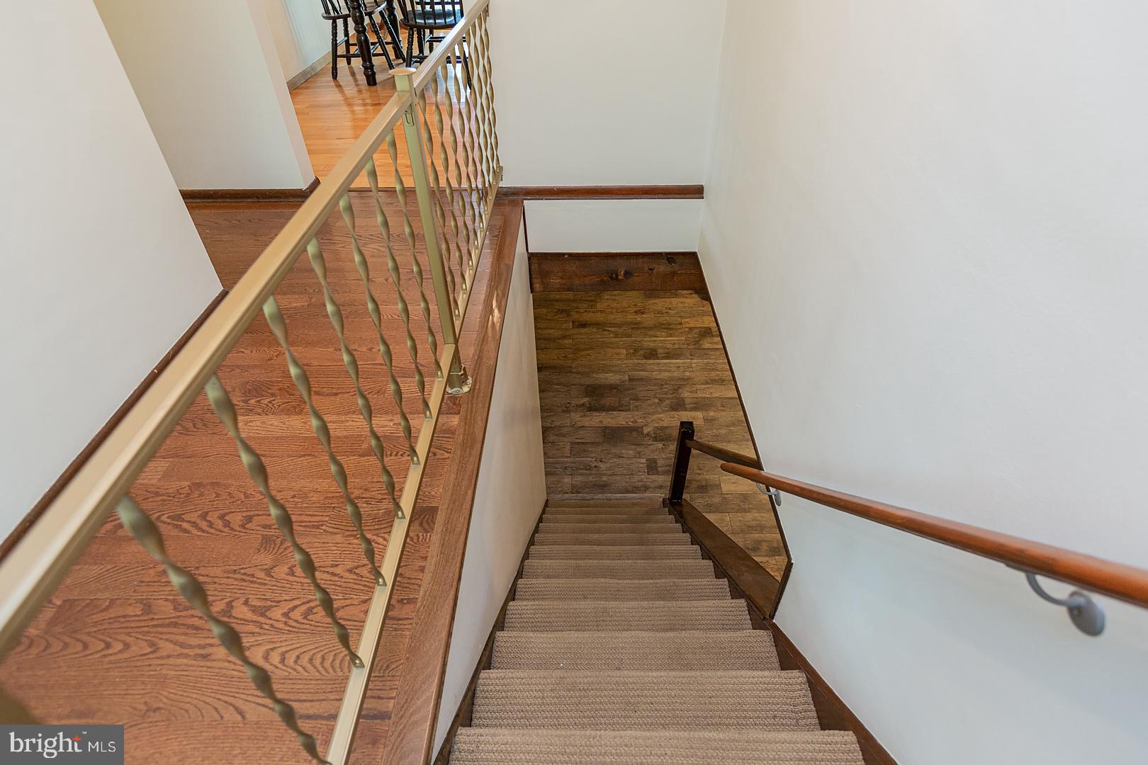590 Blue Lake Road Denver, PA 17517 - Photo 32 of 75 Foyer handrail freshly painted