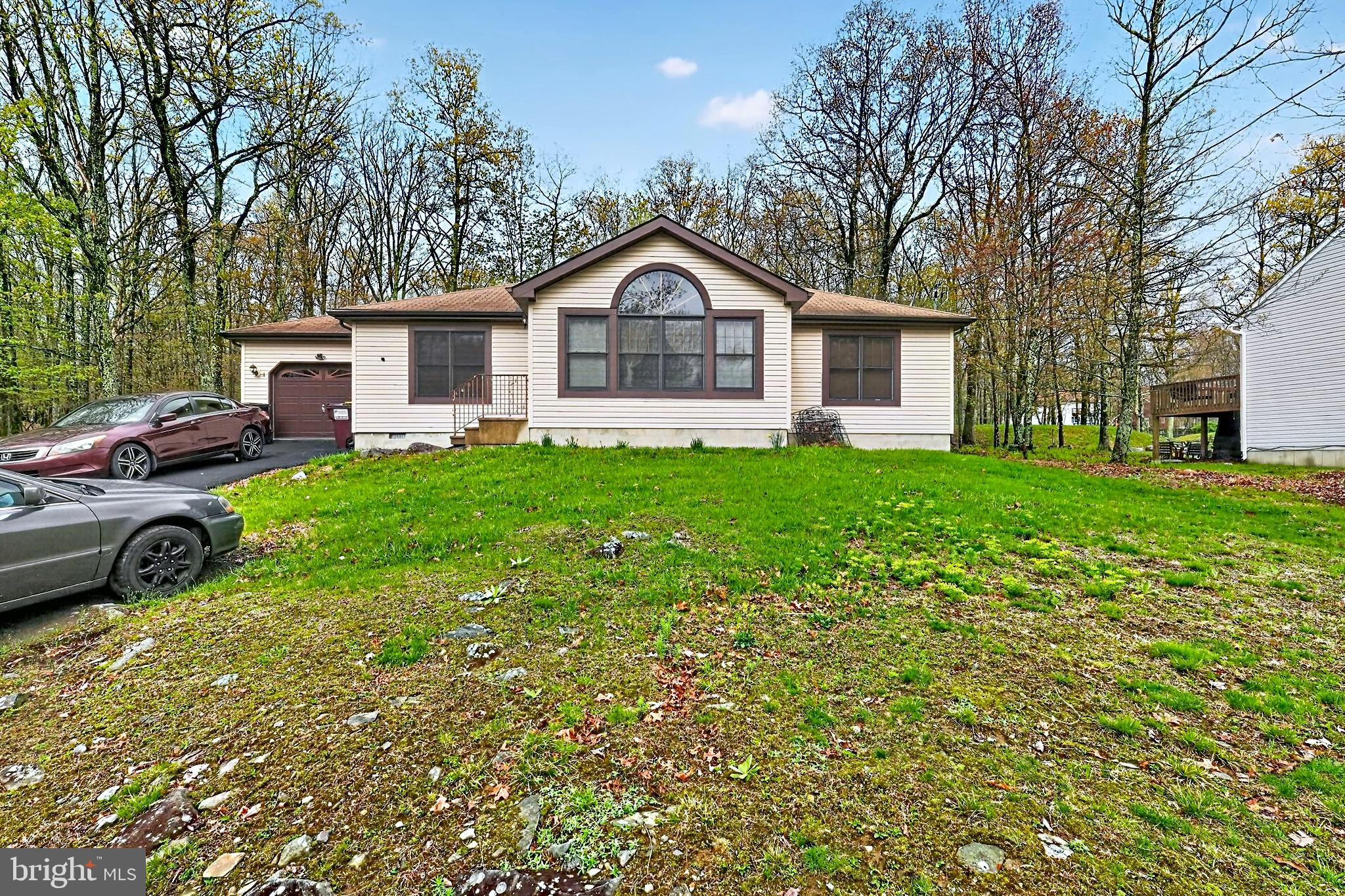 4341 Pine Ridge Drive East Bushkill, PA 18324 - Photo 18 of 19 a view of a house with a yard