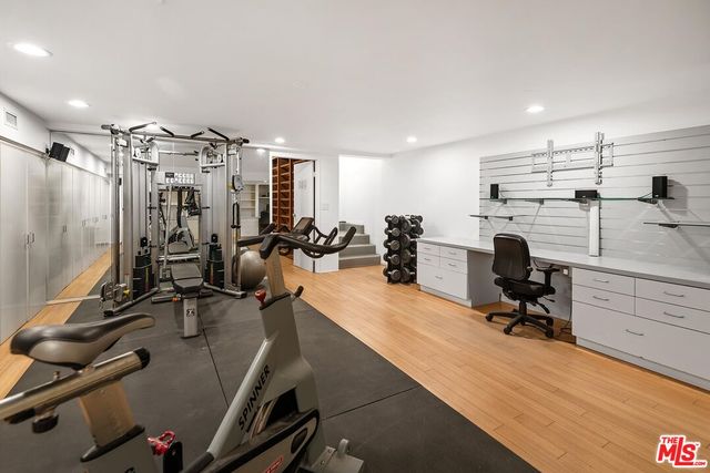 a view of a garage with cars