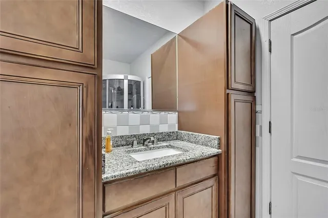 a view of an outdoor space with porch and wooden floor