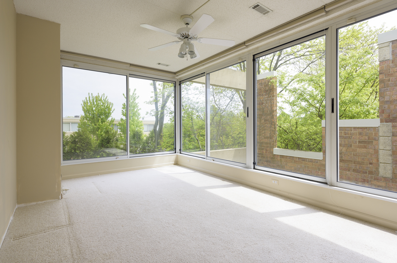 35 Avon Road Northbrook, IL 60062 - Photo 7 of 12 a view of a house with a big yard and balcony