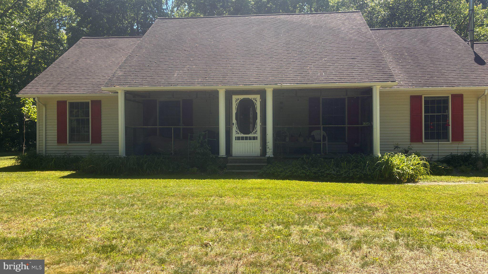 242 Firetower Road Camden Wyoming, DE 19934 - Photo 2 of 14 a front view of house with yard and trees