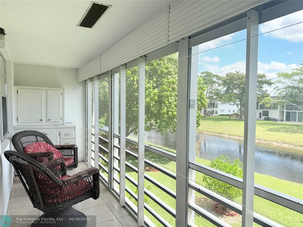 15 Markham A, Unit 15 Deerfield Beach, FL 33442 - Photo 31 of 45 a view of a livingroom with furniture